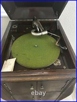 Victor Victrola phonograph record player in cabinet Victor Victrola phonograph record player in cabinet
