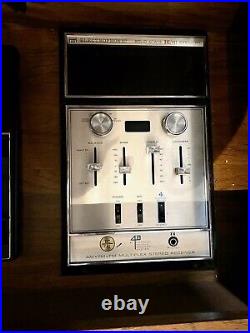 Vtg 1970s Electrophonic Stereo Console with 8 track player, record player, and radio